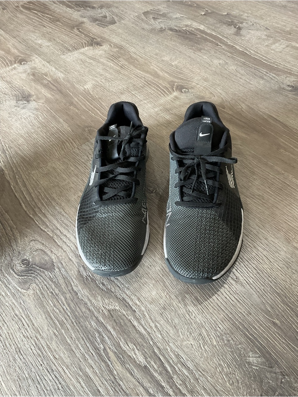 Nike Men’s Black Athletic Running Shoes with White Accents